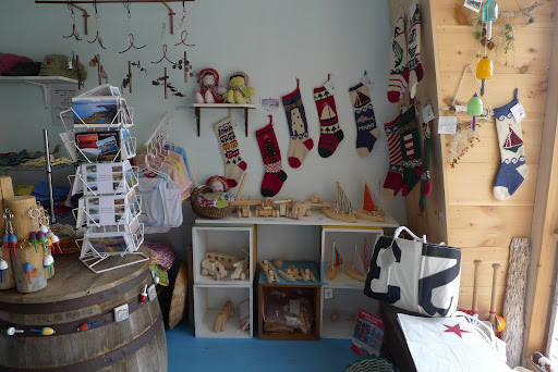 Sharkey, you and I would be good at this job.  The shop sells a selection of gifts and crafts, many from local artists.  Why, I'd say this is right up our alley!
