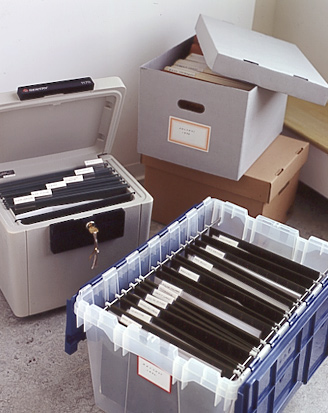 Plastic file boxes are perfect for long-term storage and are water-tight. Cardboard varieties can also be used for long-term storage in a dry place.