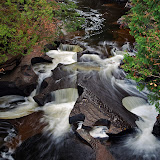 Presque Isle River in the Porcupine Mountains Wilderness Area of Upper MI. This river empties in to Lake Superior just a short distance from this location.