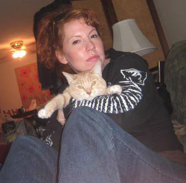 Animal loving accountant, Mary Tonden playing co-diva with her diva angel Ginger! Rescued from the Shelter in 2002.  Mary says, 