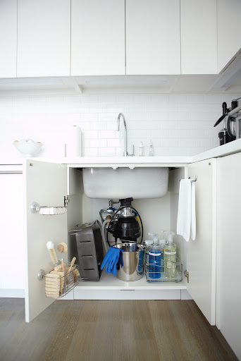 I love the baskets and towel bar mounted to the cabinet doors under my sink. They keep everything neat and concealed and within easy reach. I love the baskets and towel bar mounted to the cabinet doors under my sink. They keep everything neat and concealed and within easy reach.