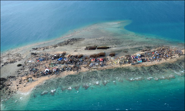 This aerial photo shows the devastation on Victory Island off of the town of Guiuan in Eastern Samar province, central Philippines on 11 November 2013, four days after devastating Typhoon Haiyan hit the country. Photo: TED ALJIBE / AFP / Getty Images