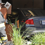 While attempting to park her vehicle at the California Community Credit Union, the driver of a silver Acura, hit the accelerator instead of the brake pedal. She drove the vehicle straight through the, mostly glass wall of the credit union. Just minutes before she crashed her vehicle into the bank, an employee was sitting at the desk directly on the inside of that glass wall. Sac City Fire Batalion Chief Williams stated that had she still been sitting there when the car came through, they probably would have arrived to find her under the vehicle. Only because of timing, no one was hurt in this incident. News_100826_VehicleIntoCreditUnion