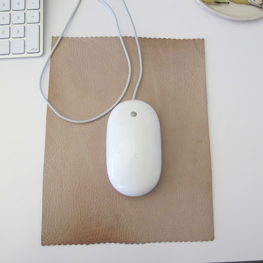 My mouse pad is a piece of leather that I have had for many years. It was a gift from a former colleague. She recently came in for a visit and couldn't believe I still had it.