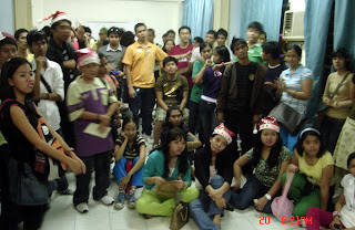Students listen to the announcement of winners
