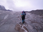 Crampons on, Angie works her way up the Muir "Snow"field.