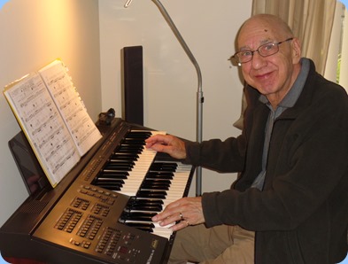 Dennis Lyons enjoying playing the Yamaha Electone EL15 organ