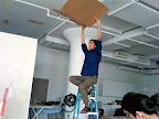 Air from a ceiling vent was blowing the fringe all about -- Nick blocked the flow like a pro.