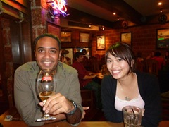 Dev and one of his friends in a pub called The Londoner with painfully priced beer
