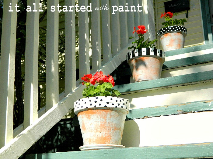 [polka_dot_painted_terracotta_planters_perched_on_porch%255B3%255D.jpg]