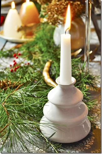 tree candle holder on Christmas table