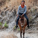 Tiger leaping Gorges - man on mule