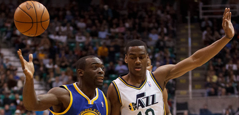Golden State's Charles Jenkins loses the ball, with Utah Jazz point guard Alec Burks defending