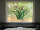 Leaded window with colored glass, strip bevels and glue chip glass for privacy