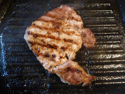 Pork cutlet in the grill pan.