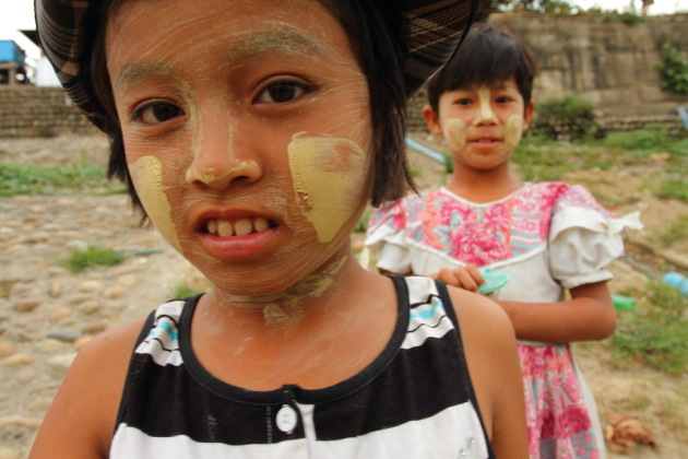 Young Myanmar girls with Thanaka on their faces