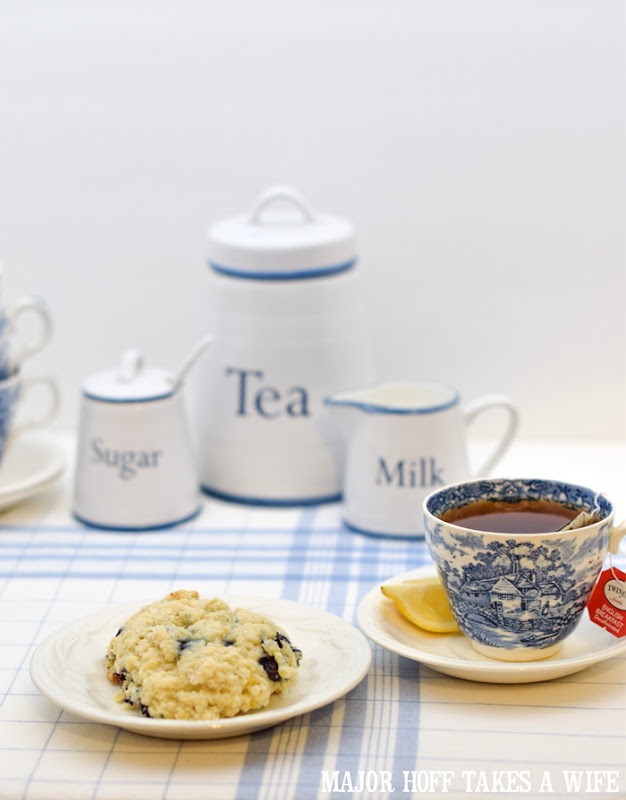 How to make homemade blueberry scones. A melt in your mouth recipe for blueberry scones. Inspired by Starbucks in house version, this blueberry scone with hints of lemon and a crunchy sugary top will delight everyone. Serve during High Tea, or just as a mid afternoon snack. Perfect along side tea or coffee, or as a stand alone blueberry dessert. You won't believe how easy these are to make! Never made scones before? Never fear, this includes a step by step tutorial on how to make scones. #HighTea #blueberries #Starbucks #scones #dessert How to make homemade blueberry scones