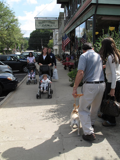 OK, enough rest - let's go see some more shops.  Maybe Uncle Carlos should get us a couple of strollers.  Those kids look happy being pushed through Katonah.