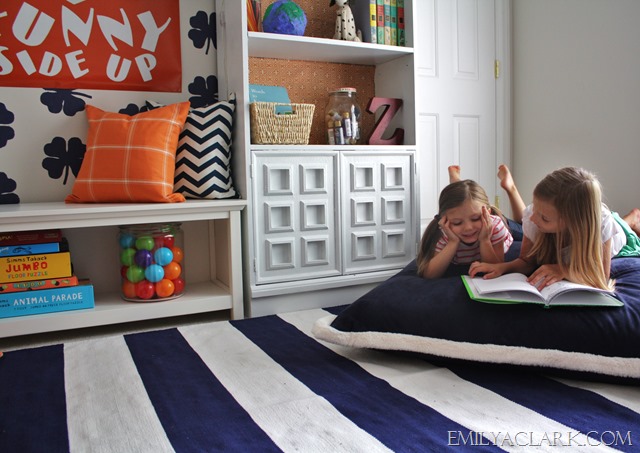 summer reading spot with floor pillow & striped rug