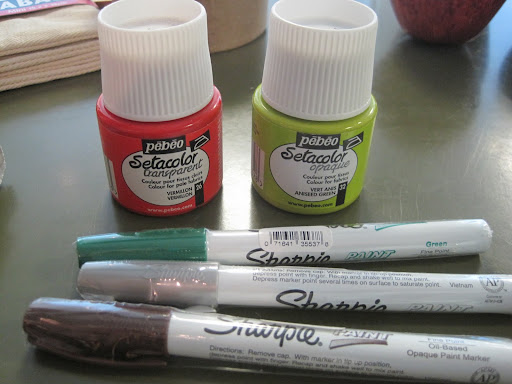 The only thing necessary to buy for this craft is fabric paint. Fabric markers are handy to add details. The only thing necessary to buy for this craft is fabric paint. Fabric markers are handy to add details.