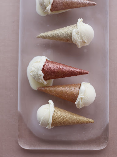 We brushed mini ice cream cones with different shades of luster dust for a frosty look. (Martha Stewart Weddings) We brushed mini ice cream cones with different shades of luster dust for a frosty look. (Martha Stewart Weddings)