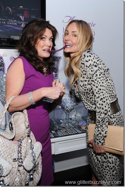 Lisa Vanderpump and Taylor Armstrong  with candy