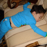 Eidan passed out on a chair after all the Christmas excitement