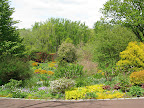 The garden you can see to the middle left is known as the tennis court garden (since it occupies the former site of one). This garden is more akin to a traditional perennial garden, but of course, not a conventional one.