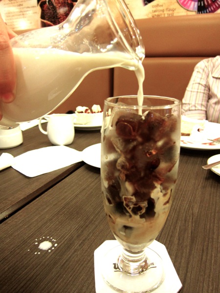 Kori Coffee Pour milk into a glass full of frozen coffee cubes and watch it melt into a delicious iced coffee drink