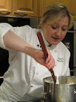Nancy hard at work stirring up dry ingredients for her lemon cake. Nancy hard at work stirring up dry ingredients for her lemon cake.