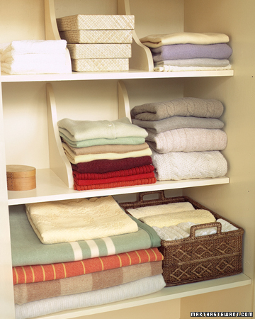 Here, basic wooden shelf brackets from the hardware store help to organize your closet when you use them on top of shelves, instead of underneath. Here, basic wooden shelf brackets from the hardware store help to organize your closet when you use them on top of shelves, instead of underneath.