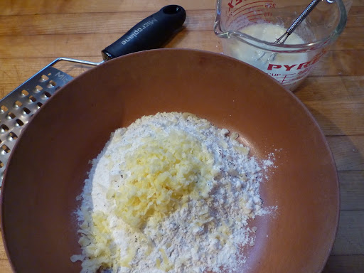Dry ingredients in the bowl ready to be mixed with yogurt, egg, and bacon drippings.