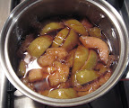 quinces, peels and all, about half-way through simmering quinces, peels and all, about half-way through simmering