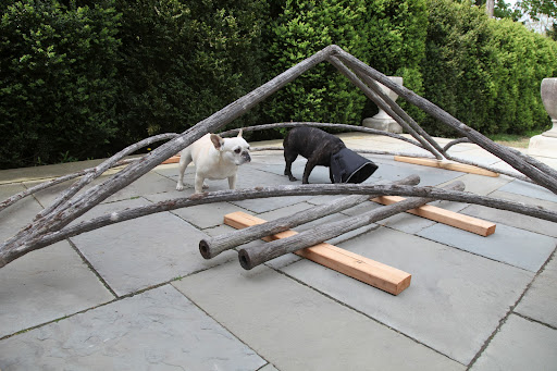 So where does this fit in, Franny?  It looks like wood but it's actually faux bois, which is French for false wood.  These pieces appear to be some kind of metal with cement molded around it.  Do you suppose they all fit together?