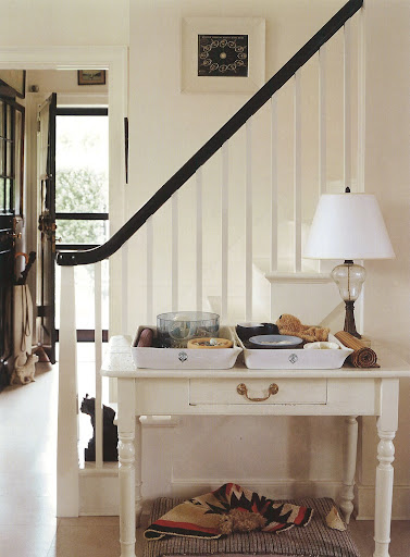 O'Brien keeps everything in its place with trays and creates a favorite place for the dog to nap. O'Brien keeps everything in its place with trays and creates a favorite place for the dog to nap.