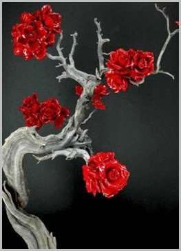 organic-natural-wedding-reception-decor-fantasy-lipstick-red-roses-curled-branches__teaser