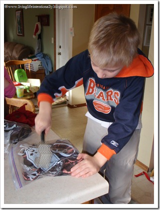 Kids love helping make oreo ball cookies in the kitchen Kids love helping make oreo ball cookies in the kitchen