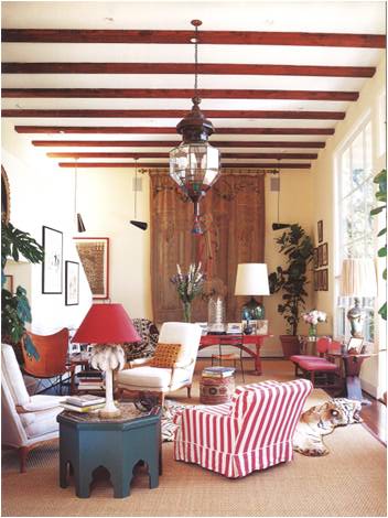 I'd be amiss to say I didn't love the Frank Lloyd-Wright chairs, but if I could take one thing from this room it would be the Moroccan hanging lamp.