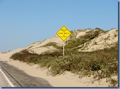 6665 Texas, South Padre Island - Watch For Sand Drifts On Pavement sign 6665 Texas, South Padre Island - Watch For Sand Drifts On Pavement sign