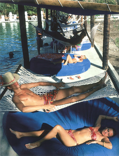 A nap seems to go hand-in-hand with a pool day. Plantation Cocoyer, Cocoyer Beach, Haiti, 1982. (Poolside With Slim Aarons, Abrams) A nap seems to go hand-in-hand with a pool day. Plantation Cocoyer, Cocoyer Beach, Haiti, 1982. (Poolside With Slim Aarons, Abrams)