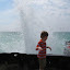 Enjoying the waves at breakwall next to Pointe Betsie Lighthouse. &ndash; 02-Aug-2010