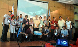 MCCID College Administration and Faculty with Anniversary Cake