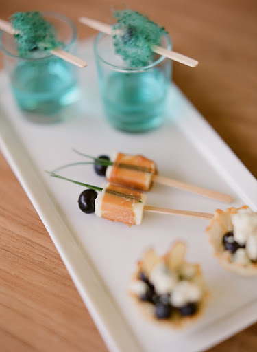 Proscuitto-wrapped brie with chive sprigs and a blueberries would be easy to serve during the cocktail hour. Proscuitto-wrapped brie with chive sprigs and a blueberries would be easy to serve during the cocktail hour.