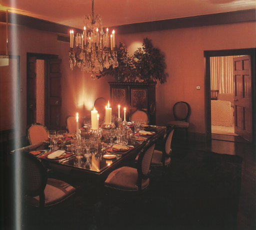 Isn't this dining table stunning? I love how the glass top reflects flickering candlelight. Isn't this dining table stunning? I love how the glass top reflects flickering candlelight.