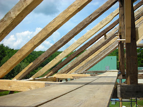 Since there was no indication of the original rafter position, we staggered new rafters with those that had been repaired.