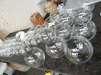 In going with the New Year's Eve theme, glass vessels were meant to mimic the ball in Time's Square... and bubbly.
