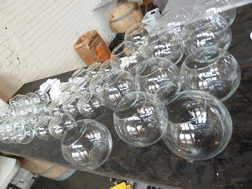 In going with the New Year's Eve theme, glass vessels were meant to mimic the ball in Time's Square... and bubbly.
