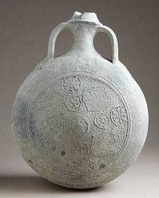 Canteen Iran Canteen, 14th century Ceramic; Vessel, Fritware, unglazed, 12 x 9 1/4 x 4 1/4 in. (30.48 x 23.50 x 10.80 cm) Gift of Andrew Hale and Kate Fitz Gibbon (AC1998.223.1) Art of the Middle East: Islamic Department.