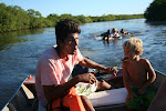 Inner tubing and whistling in the river Caraiva, Brazil
