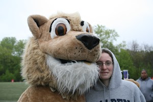 Senior Autumn Deheulle hugging Nedlam. Photo by Lesley Ta IMG_2665.jpg